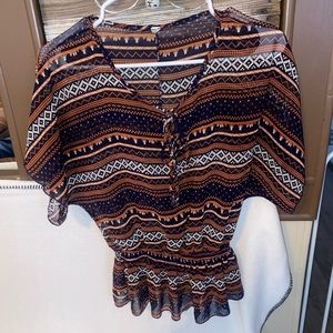 VERY CUTE, Aztec design, thin material, top. Alas-tic bottom band. Sz med. $8